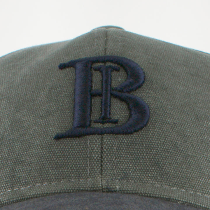 Belfry Palestra green navy baseball cap with logo and leather adjuster detail