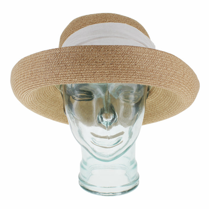 Natural cloche hat designed for summer travel and everyday comfort