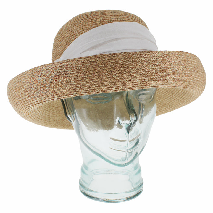 Natural cloche hat in paper yarn with lightweight breathable design and packable structure