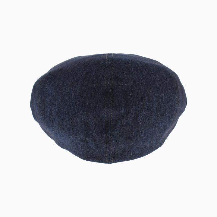 Belfry Senna navy linen flat cap with soft natural texture and classic five panel silhouette