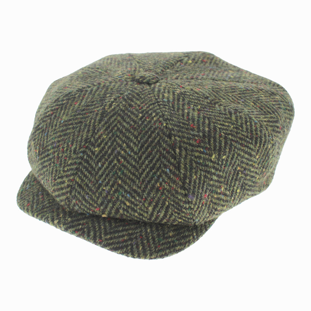 Wigens Shelby green wool newsboy cap with bold herringbone pattern, handcrafted in Sweden