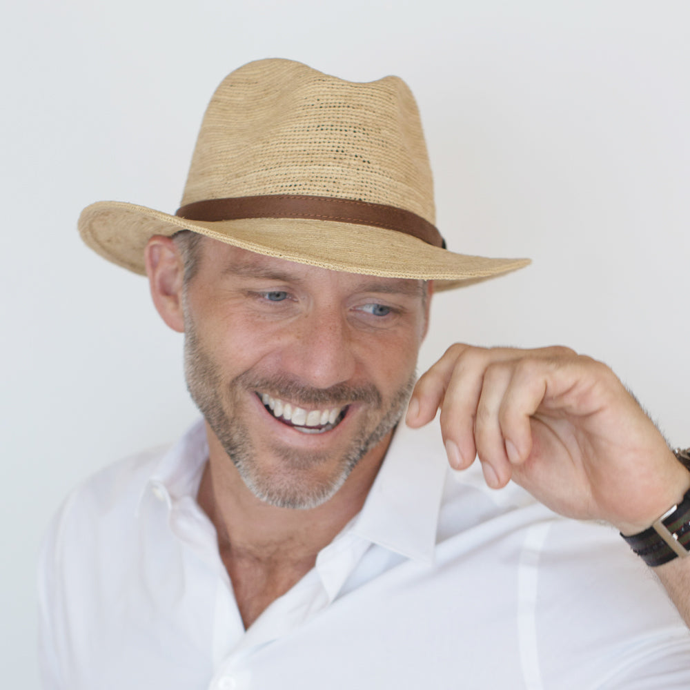 Natural raffia straw safari hat with center dent crown and suede band by Belfry Italia