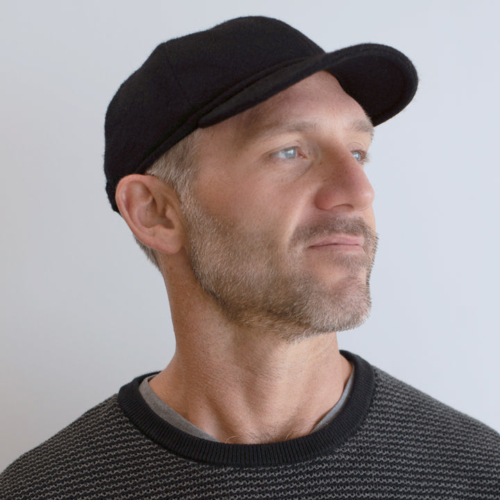 man wearing black cashmere baseball cap belfry tomaso