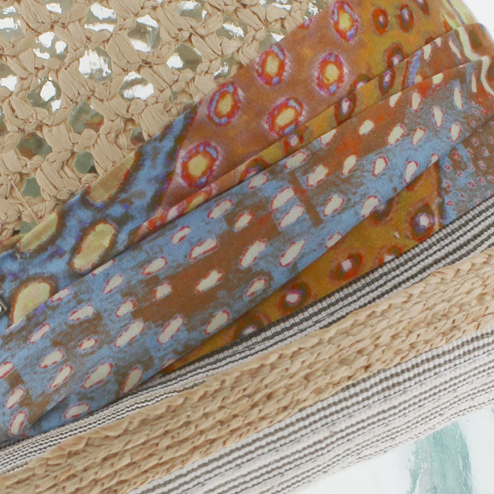Khaki cloche hat with open weave crown and lightweight feel for warm weather wear
