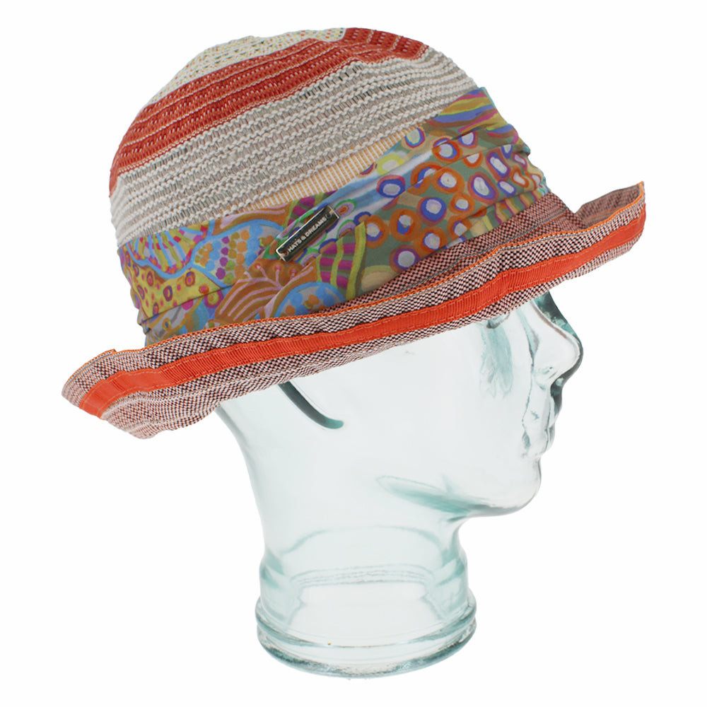 Belfry Verona orange bucket hat with vibrant pattern and travel friendly design
