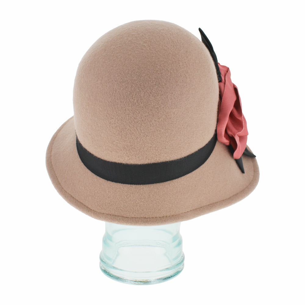 Detailed shot of the Belfry Woodhouse taupe cloche hat highlighting its 1920s-inspired silhouette, grosgrain band, and flower accent, crafted for chic fall and winter outfits